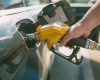 ¿Cuáles son las principales implicaciones técnicas que tiene la mezcla del etanol en gasolina en los vehículos automotores ?